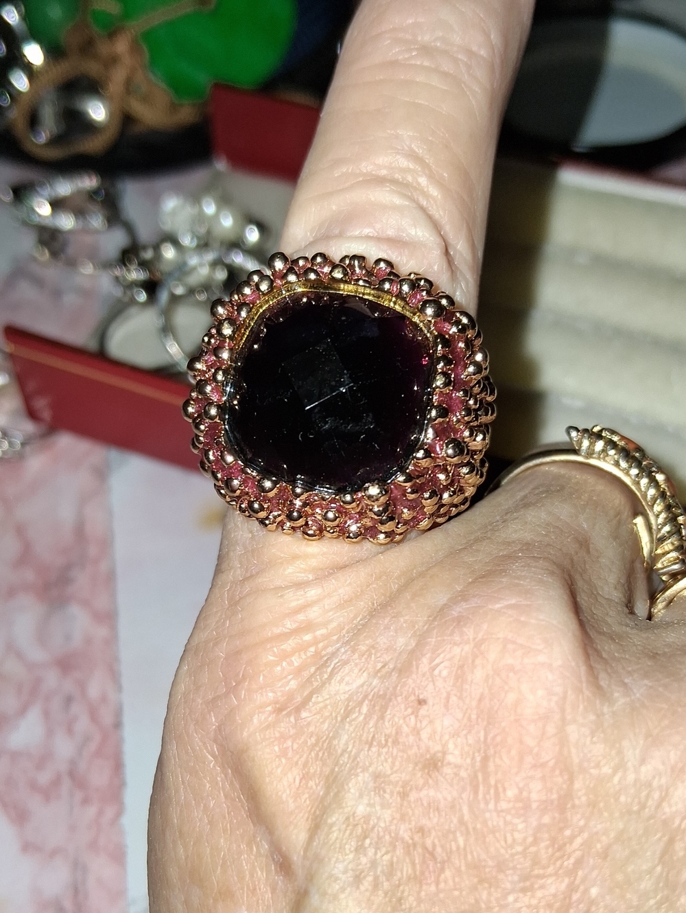 Gold-Tone Statement Ring with Deep Garnet Red Center